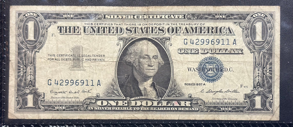 Two ($1) Silver Certificates in a Folder